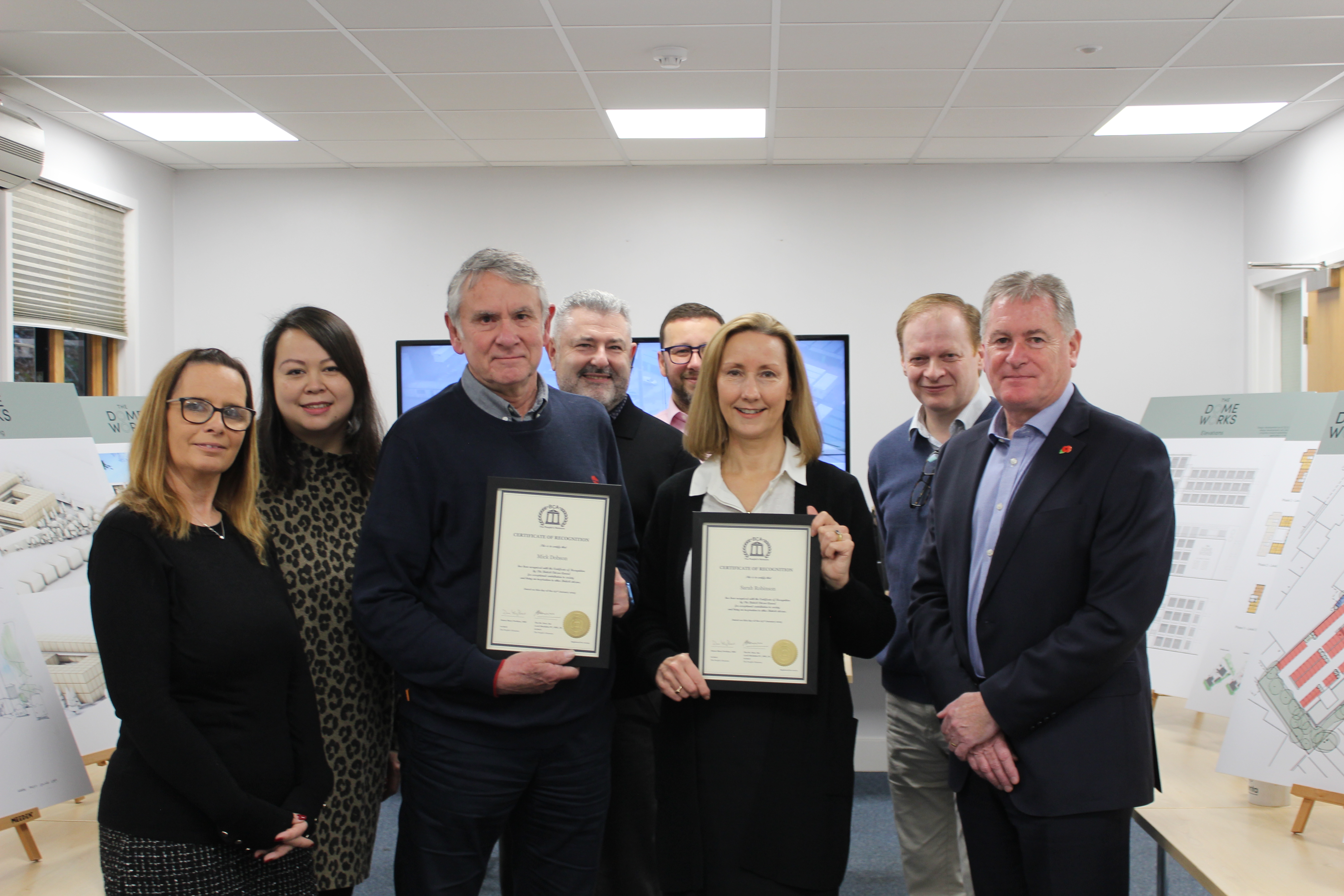 Wenta's Senior Management Team congratulating Sarah and Mick on their well-deserved recognition